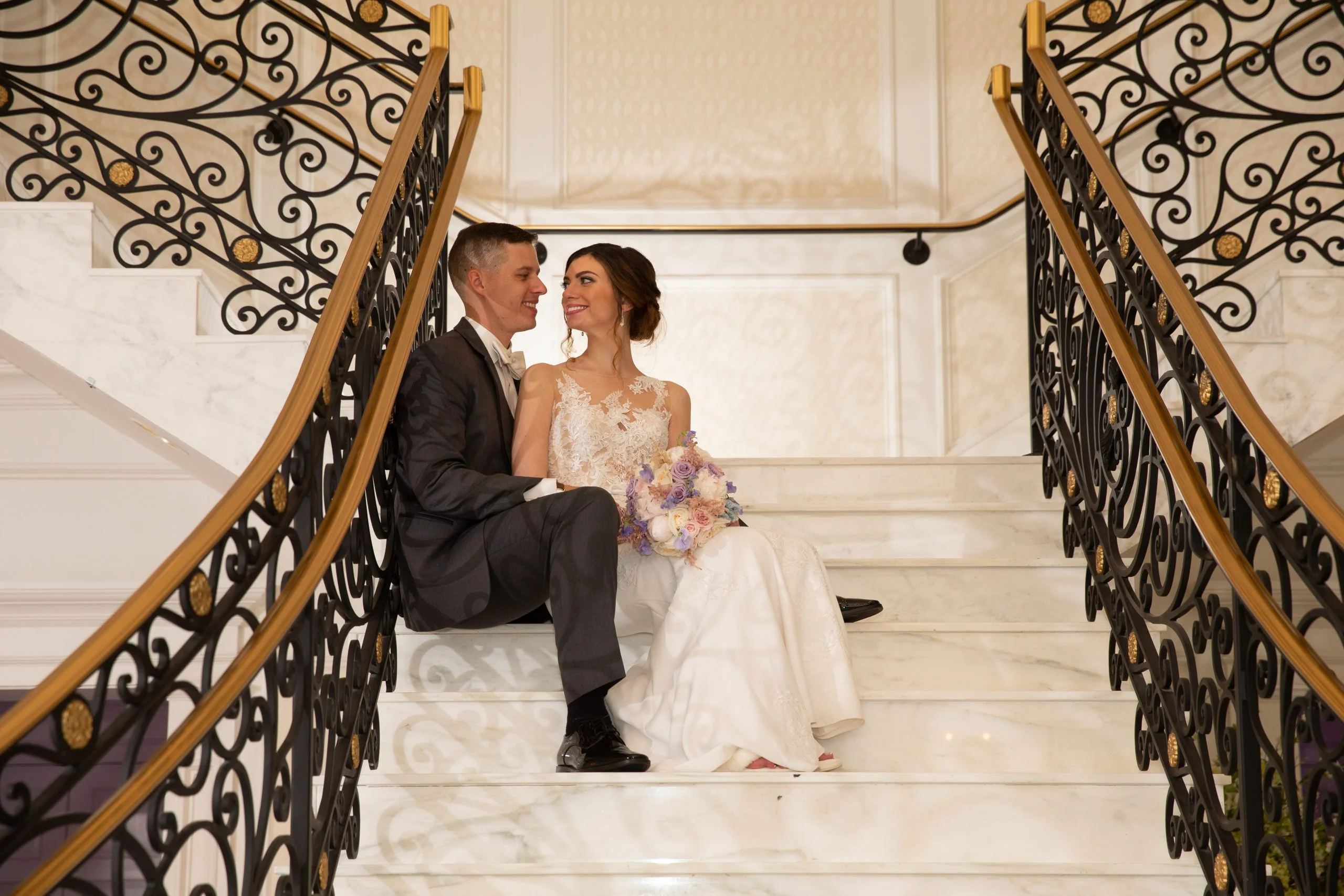 Meadow Wood wedding couple sitting on staircase